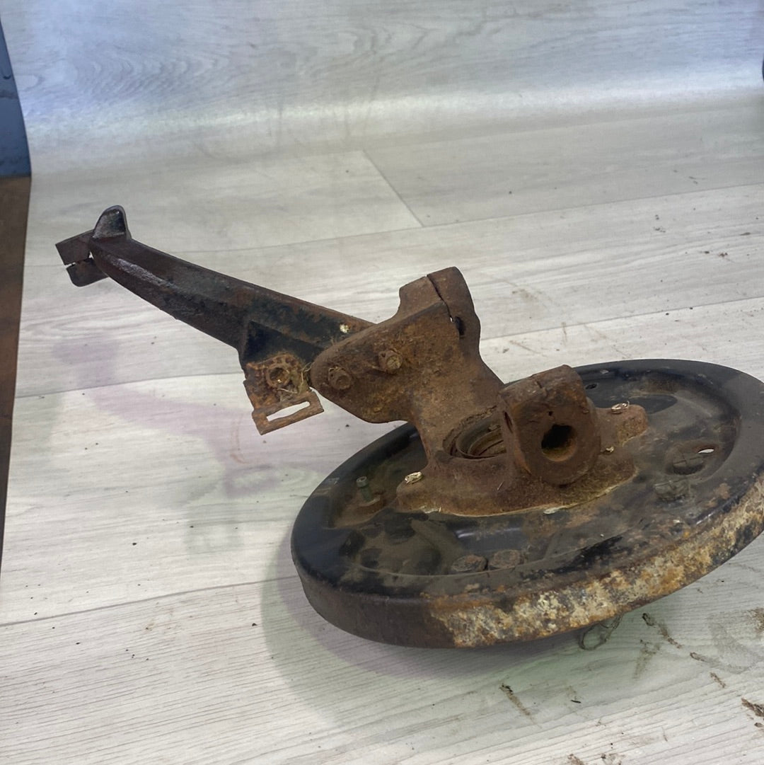 Suzuki LTF250 front left knuckle and backing plate