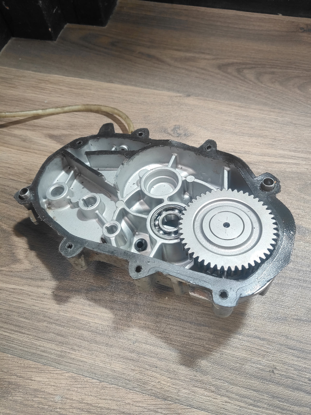 Polaris Outlaw 50 transmission output cover