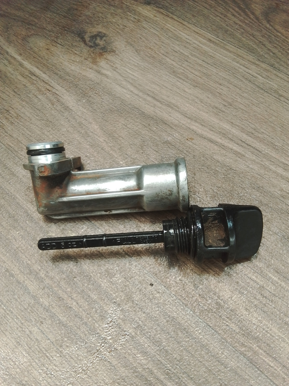 Polaris Outlaw 50 engine oil filler tube with dipstick