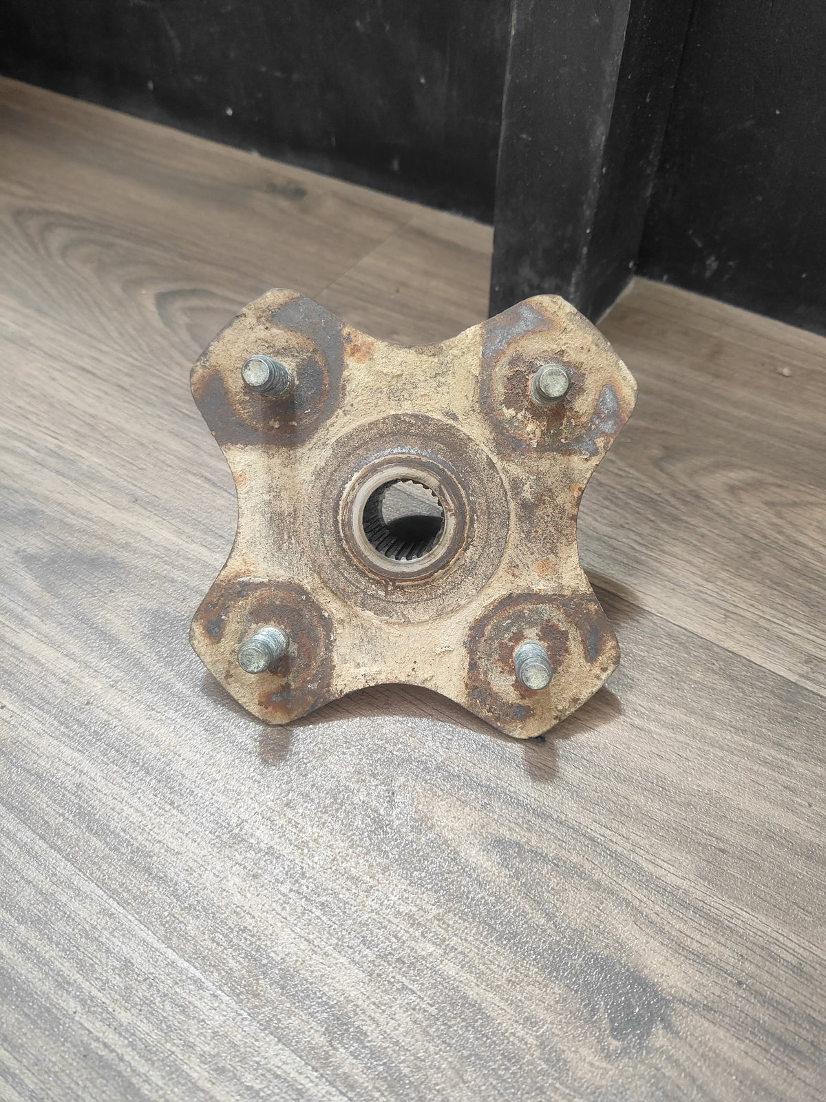 Suzuki KingQuad 400 left rear hub