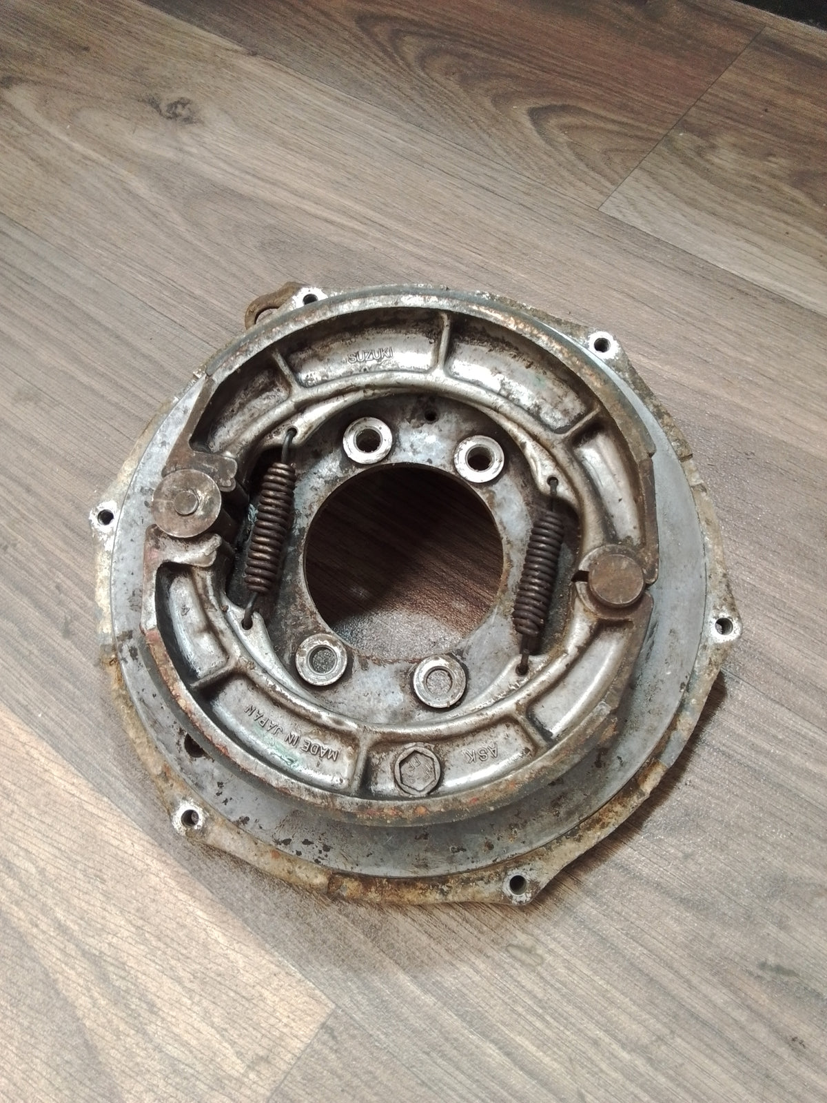Suzuki KingQuad 400 rear brake backing plate