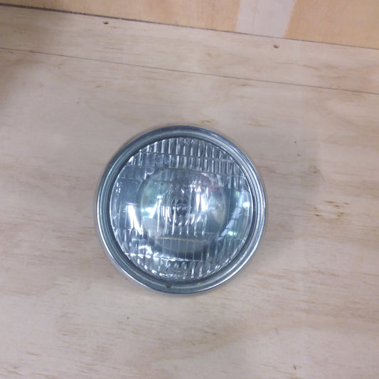 Suzuki TF125 headlight